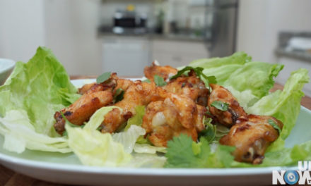 A plate of food with lettuce and shrimp.